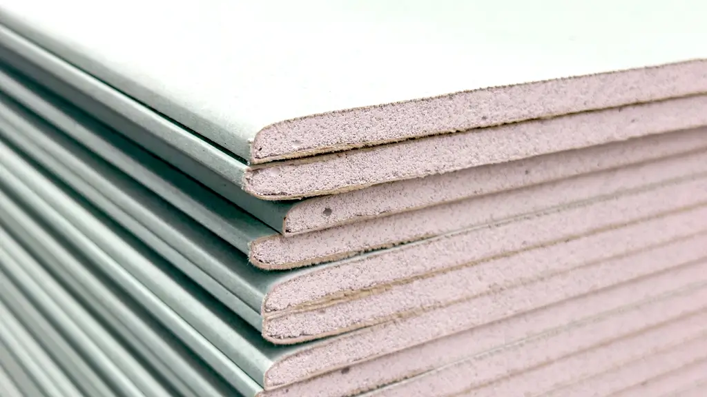 Trockenbau-Platten Nahaufnahme eines Stapels rechteckiger Trockenbauplatten mit glatter Oberfläche und scharfen Kanten